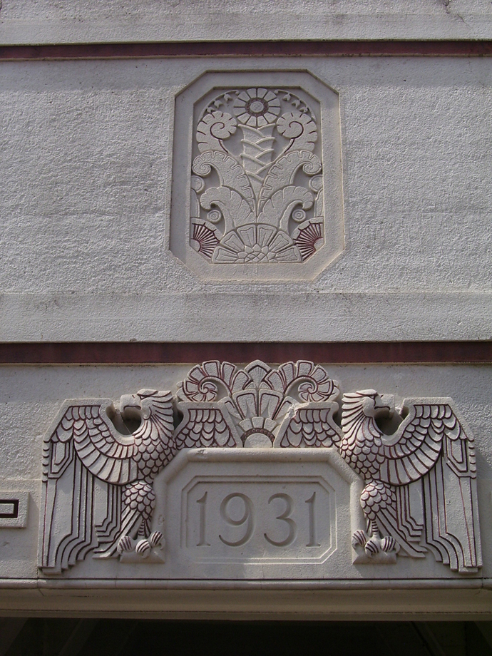 Ornaments above walkway are eagle and flower designs